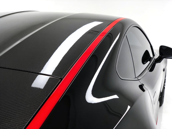 Carbon fiber splitter close-up detail - RO34 aero and splitters guide editorial