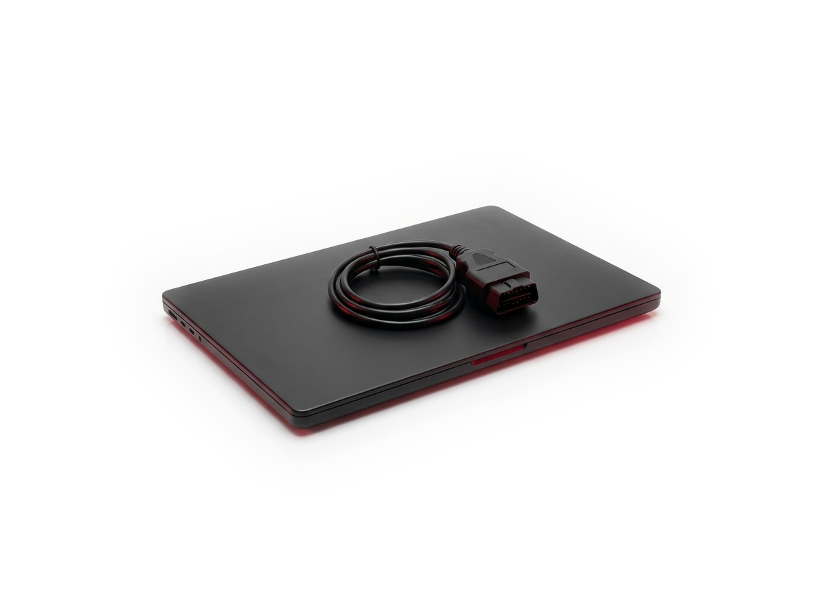 ECU tuning — laptop and OBD-II cable