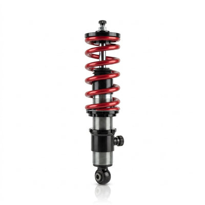 Adjustable coilover suspension strut