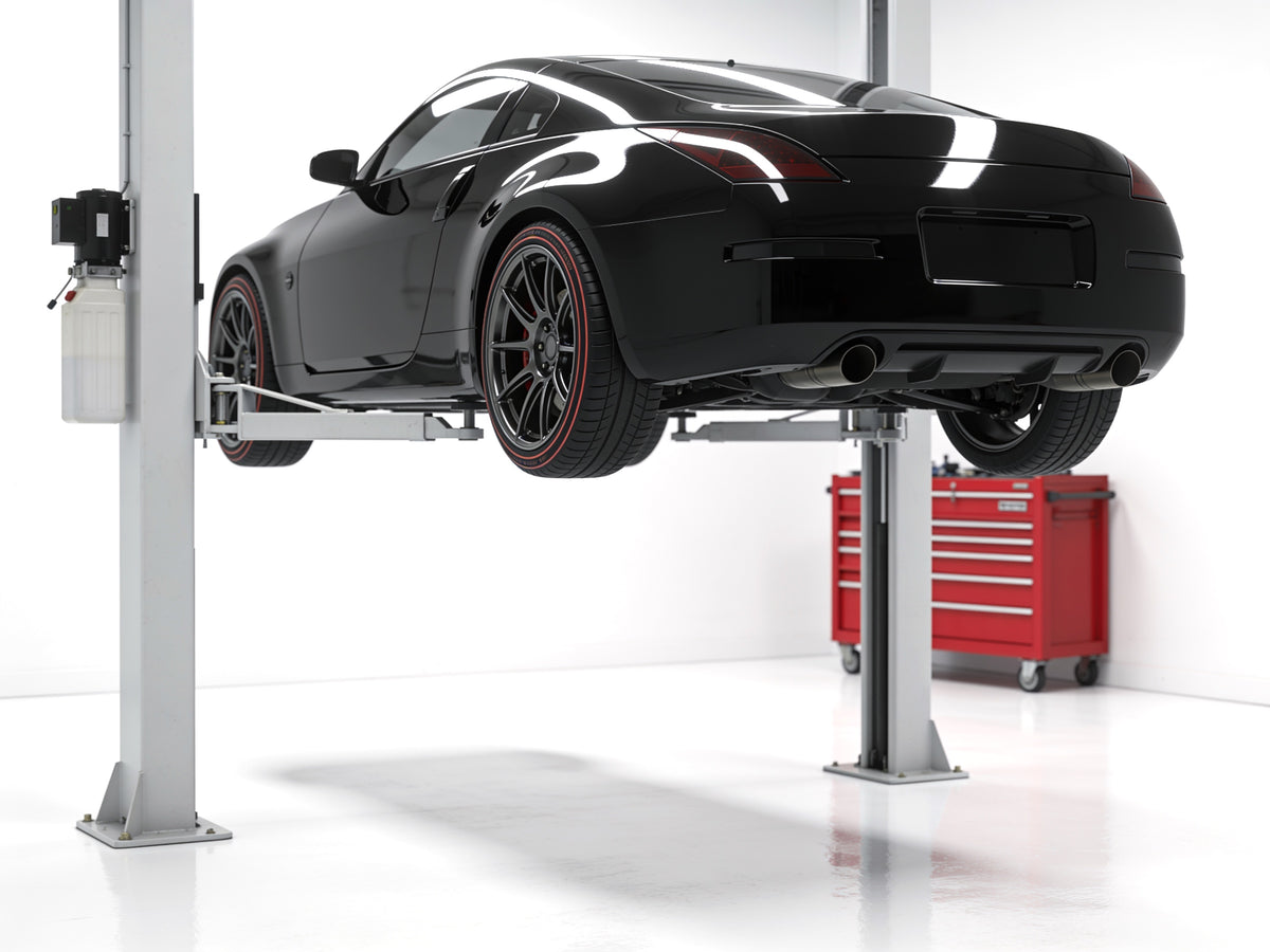 Clean performance workshop with car on lift - RO34 about editorial