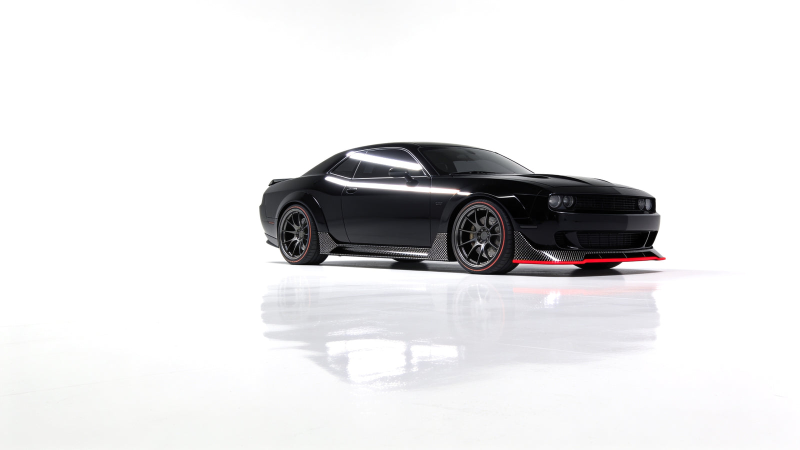 Carbon fiber aero body kit parts in white studio setting - RO34 hero banner